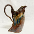 Bent Pitcher