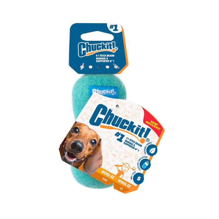 A Chuckit! Wool-ee Bone in light blue comes in packaging with a happy dog image and product details, highlighting Chuckit! as the #1 fetch brand and noting this handcrafted dog toy is made from natural wool.