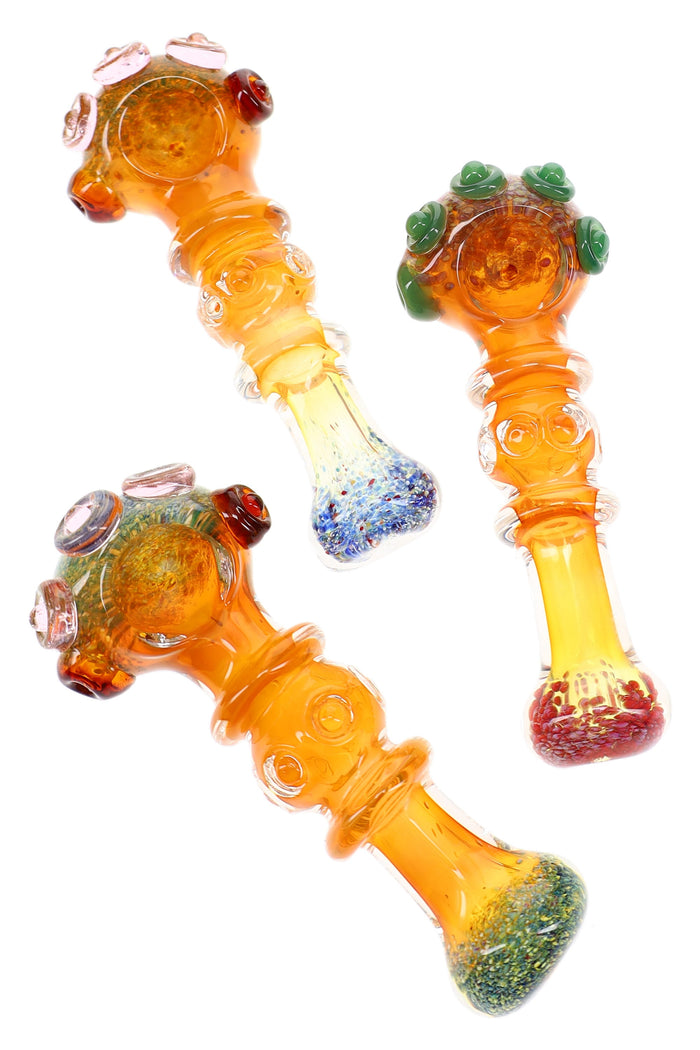 Assorted 5″ gold fumed glass spoon pipes with frit accents, indented rings, and raised marbles