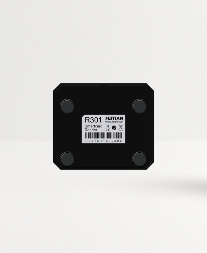 Back view of FEITIAN R301 contact smart card reader with product label and anti-slip rubber feet.