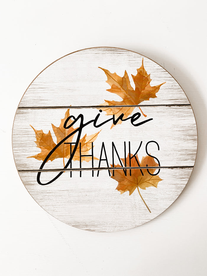 Round Maple Leaf Sign