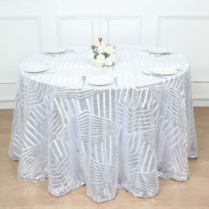 Round sequin tablecloth with geometric pattern on dining table, styled with plates and decor.