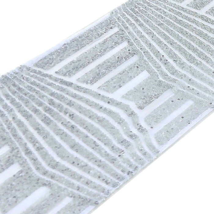 Textured silver adhesive tape on a white background.